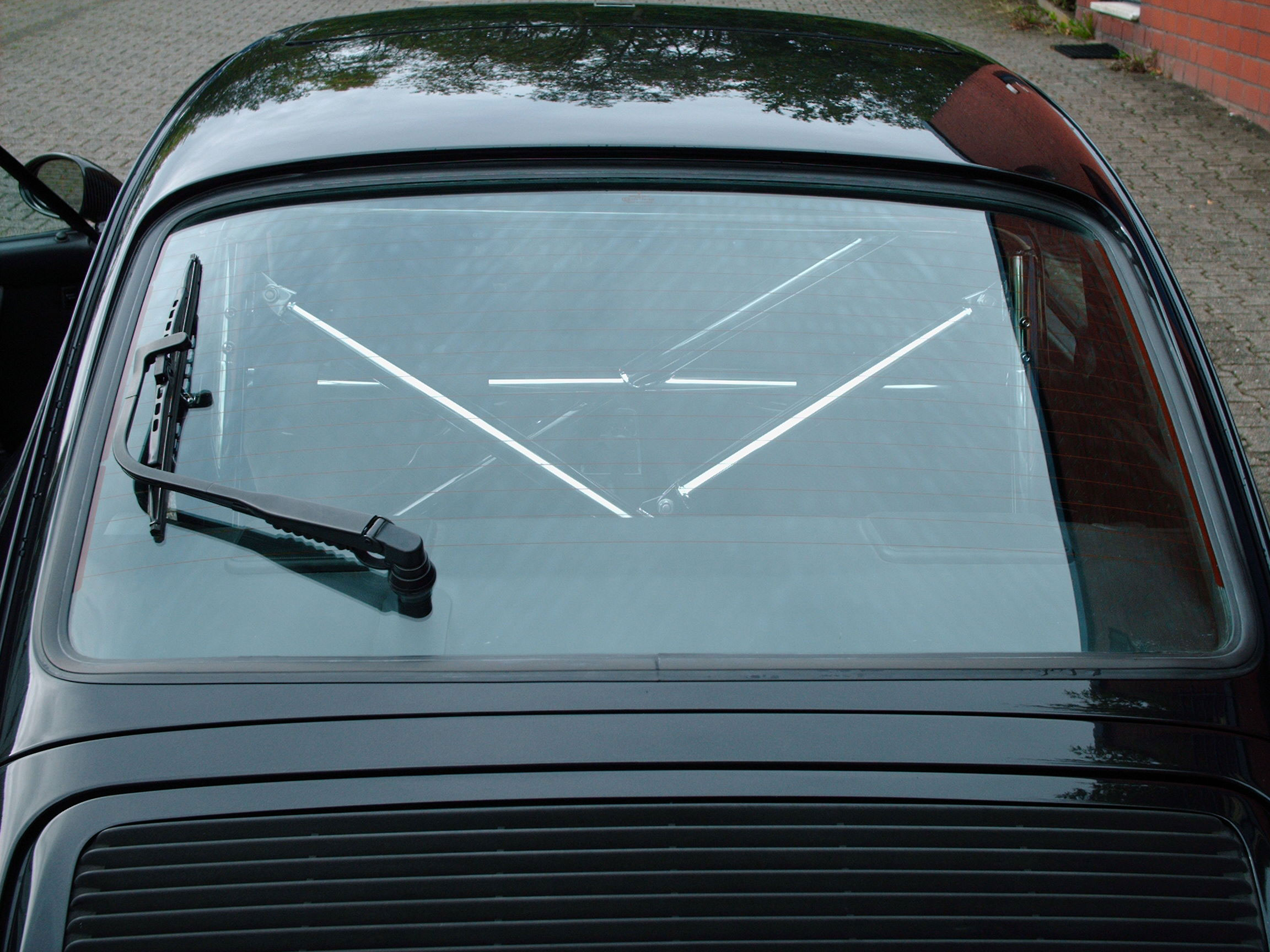 Überroll-Käfig passend für Porsche 964, inkl. Diagonal-Kreuz 3-teilig, inkl. eingeschweißtem und gebogenem Grutrohr, inkl. Diagonale durch das Gurtrohr, Oberfläche Edelstahl HOCHGLANZ poliert